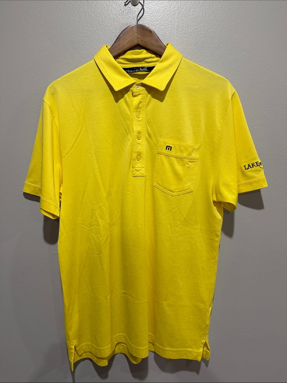 Travis Mathew Men's Bright Yellow Polo with Lake of Isles Embroidered size M